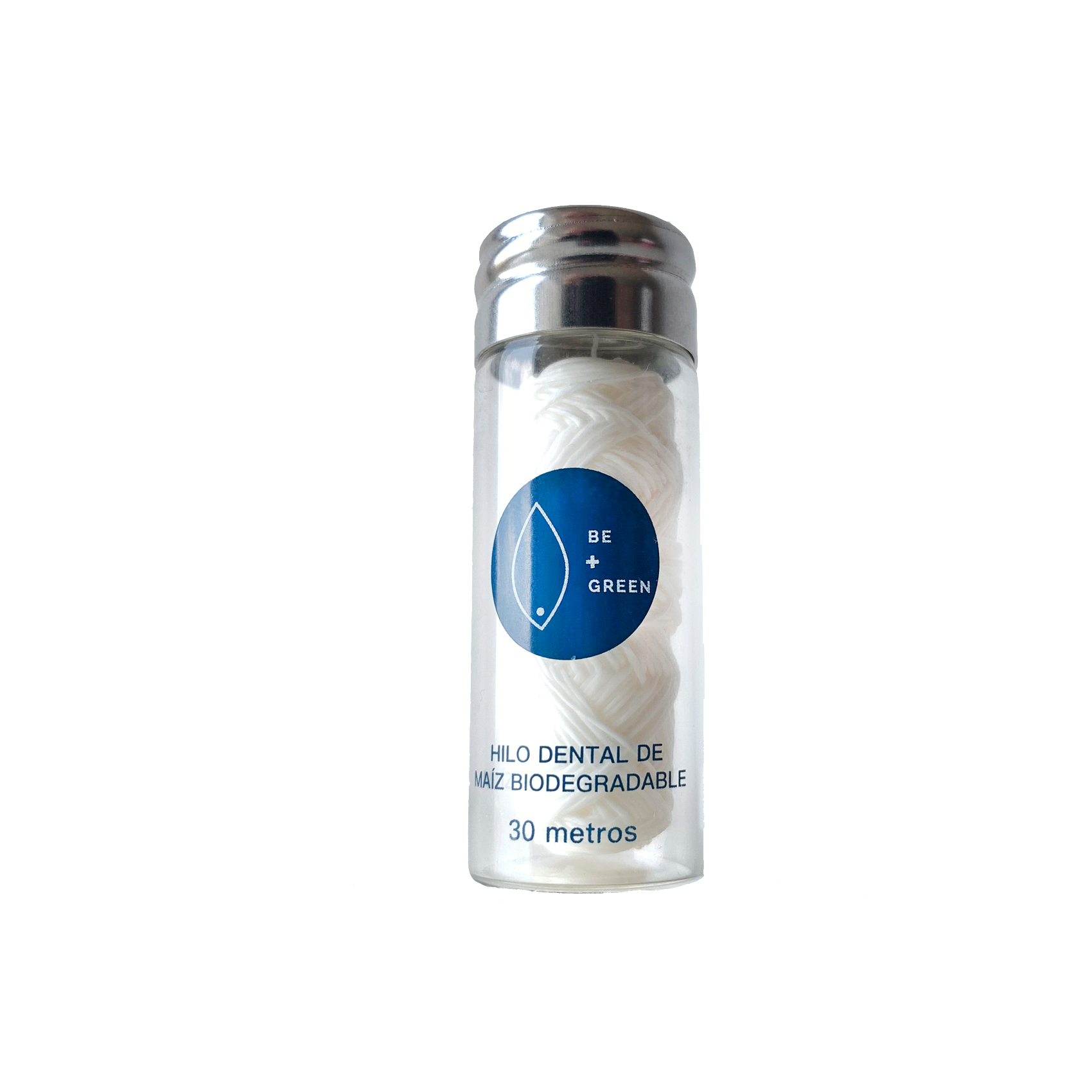Hilo dental de maíz en envase de vidrio reutilizable de 30 metros para una higiene bucal efectiva y sostenible.