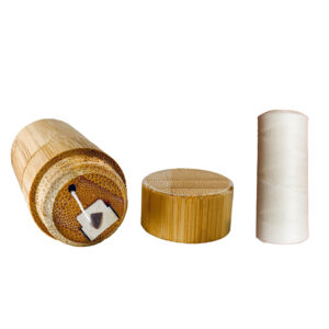 Kit hilo dental de maíz con envase de bambú reutilizable y 90 metros para una higiene bucal sostenible.