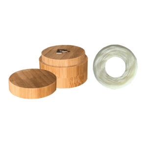 Kit hilo dental de maíz con envase de bambú redondo reutilizable y 30 metros para una higiene bucal sostenible.